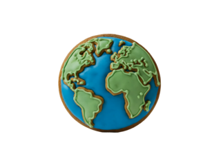 Gingerbread cookie shaped like planet Earth decorated with bright green and blue royal icing isolated on black background