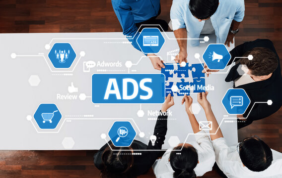 A dynamic team collaborates on a digital advertising strategy focused on social media, utilizing analytics and technology for effective marketing and engagement. Amity - Powered by Adobe