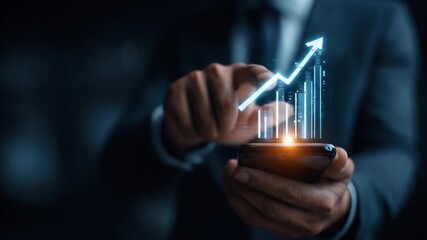 Businessman interacts with financial data graph on smartphone screen - Powered by Adobe