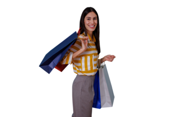 Woman smiling and holding shopping bags, a happy consumer enjoying retail therapy and sales, transparent background