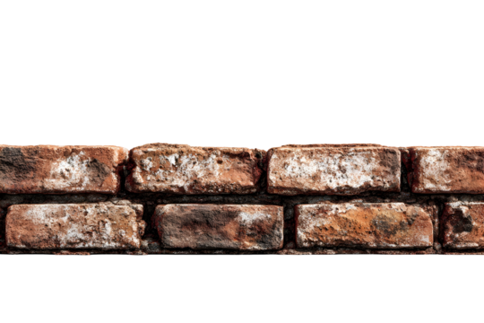 Close-up of weathered brick wall against black background