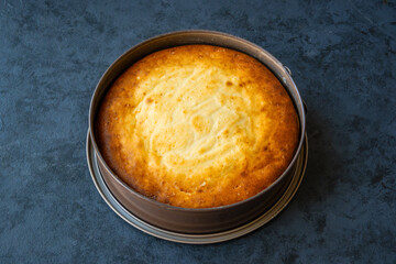 Homemade cheesecake in a baking tin