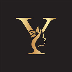 Elegant beauty salon logo with a woman's face silhouette and letter Y