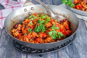 Minced chicken and kidney beans stew in tomato sauce