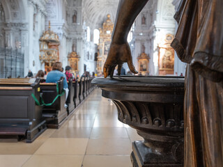 Close up detail of the hand of a statue in a famous ancient church