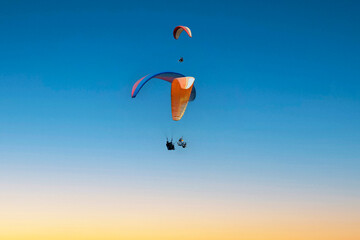 Paragliding over the clouds sunset view at Bir Billing Himachal Pradesh India. Clouds in the sky