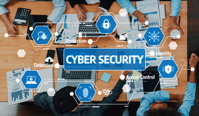 A diverse team engages in a cyber security strategy session, focusing on vital areas such as protection, access control, and identity management in a modern workspace. Amity