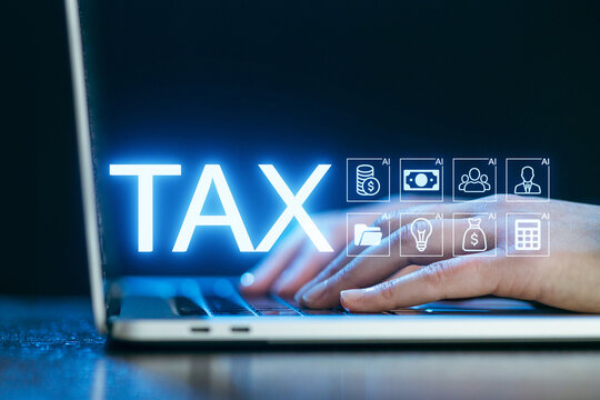 Digital tax preparation process with hands on laptop and financial icons in background - Powered by Adobe