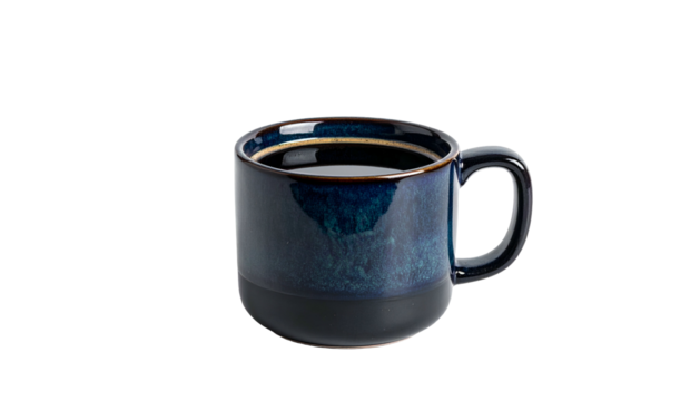 A ceramic mug with dark blue glaze, filled with black liquid, set against a black backdrop