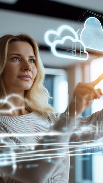 Smiling woman interacting with virtual cloud computing hologram in modern office.
