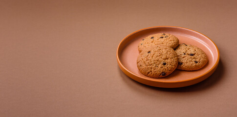 Food, oatmeal chocolate raisin cookies, dessert or breakfast pastry. Oatmeal chocolate cookies