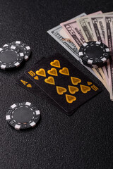 Obraz premium Playing blackjack or baccarat card game in casino with chips. Cards and chips on black felt