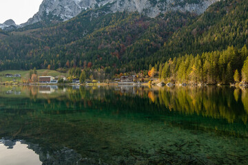 Fototapeta premium Autumn Reflections on a Mountain Lake in the Alps