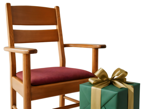 Traditional wooden armchair featuring a maroon cushion and a festive green gift box tied with a golden ribbon, isolated on transparent background.