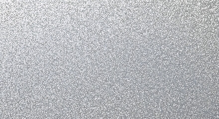 Fototapeta premium A close up view of a sparkling silver glitter background with a uniform texture and bright appearance