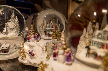 Festive snow globes with winter scenes