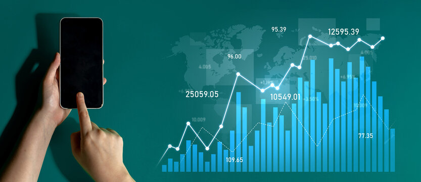 A close-up of a hand interacting with a smartphone beside vibrant data visualization featuring growth charts and world map, symbolizing financial analysis and modern technology. Scalp - Powered by Adobe