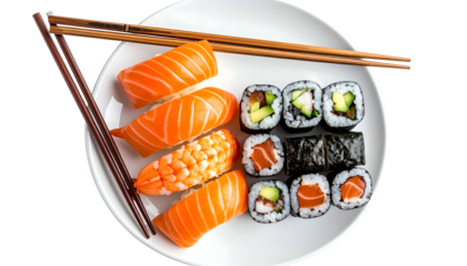 A plate of sushi with salmon nigiri, rolls, shrimp, and chopsticks