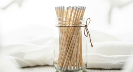 Matches in a glass jar with string tie for decoration concept