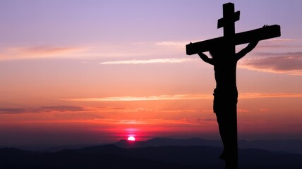 A silhouette of Christ on the cross against a vibrant sunset over mountains, symbolizing sacrifice, hope, and spiritual reflection.