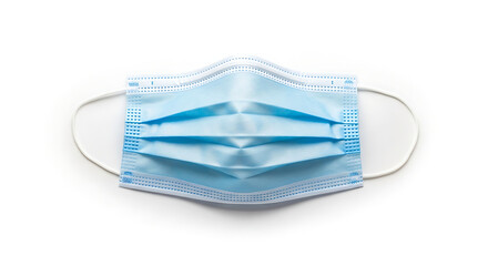 A light blue surgical mask with white elastic ear loops on a white background in a centered close up view