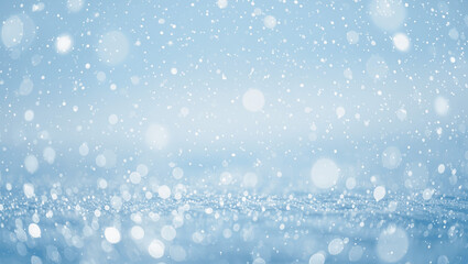 Abstract blurred snow bokeh background, pastel blue and white tones