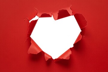 Red paper torn heart shape valentine's day love background texture concept
