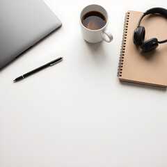 Minimalist Workspace Essentials: A top-down view of a tidy workspace, showcasing a laptop, coffee mug filled with warm beverage, pen, notebook, and headphones. The setup creates a clean.