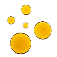Abstract arrangement of five golden yellow oil droplets with reflections and bubbles isolated on transparent background