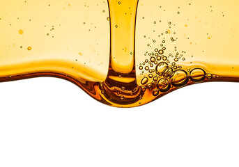 Viscous golden liquid pouring and creating bubbles with a dark background isolated on transparent background