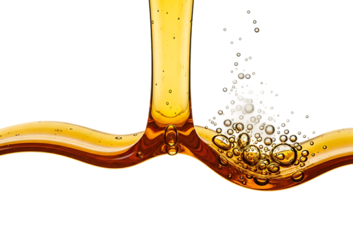 Golden viscous liquid flowing and splashing with tiny mechanical gears and bubbles isolated on transparent background