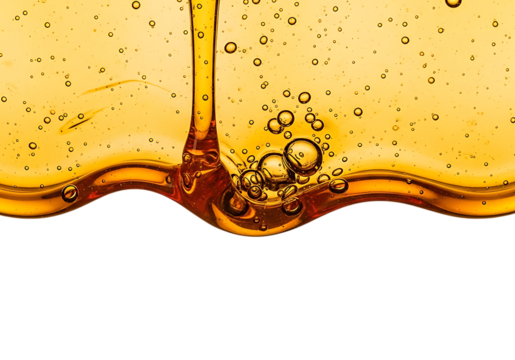 Golden honey or oil pouring and flowing with air bubbles forming a wave isolated on transparent background