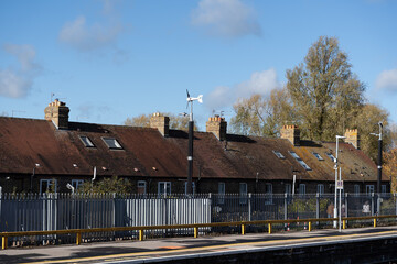 Quaint houses along train tracks