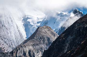 Rocky peaks and snow-capped mountains in high-altitude regions