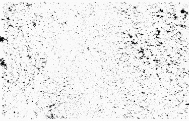 Grunge texture background with scattered black ink spots on a white canvas for creative designs and art projects