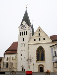 Wide view of Eichstätt cathedral and adjoining historic buildings on a cloudy day, Germany, Eichstätt, 7 November 2025