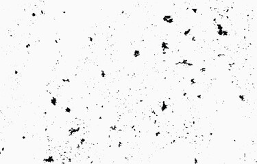 Grunge texture featuring scattered dark patterns on a light background for creative projects and design applications