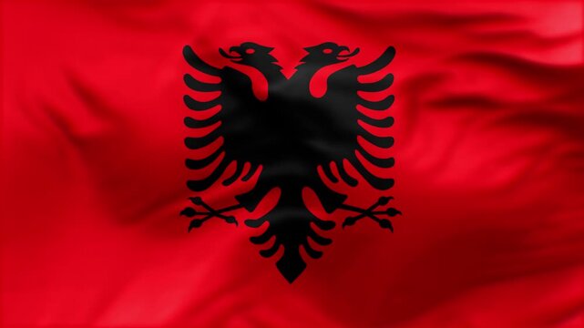 Albania flag is waving in the wind. High-quality flags are perfect. They are perfect for various creative projects.