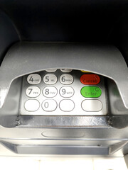 a numeric keypad on an atm machine