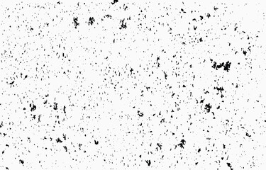 Distinctive grunge texture vector with black specks scattered against a white background, perfect for design projects and creative endeavors