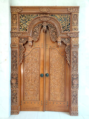 Gebyok wood carvings main door in Mosque.