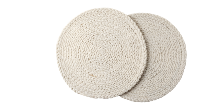 Two round woven placemats isolated on transparent background for dining table
