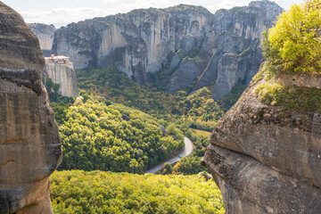 Breathtaking High-Angle View of the Giant Rock Pillars of Meteora and the Town of Kalampaka in the Valley Below