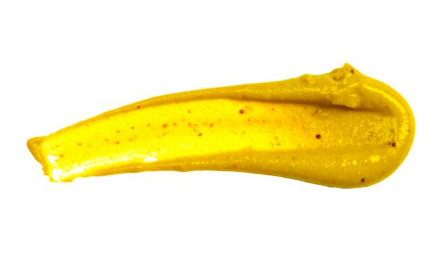 Mustard smear isolated on a white background, demonstrating a delicious culinary condiment