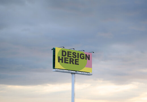 Blank Billboard Mockup Against a Dramatic Cloudy Sky
