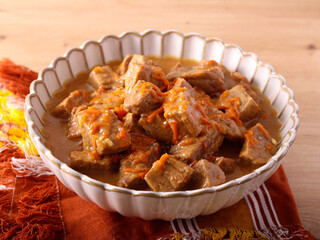 Beef with gravy in the bowl