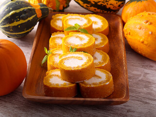 Homemade pumpkin roll with cream cheese