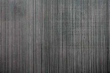 Obraz premium Abstract dark background with vertical painted texture and subtle horizontal weave. Modern monochrome wall covering or canvas