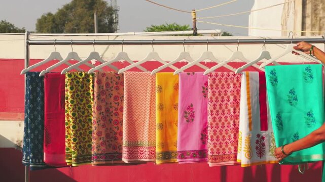 "Freshly Block Printed Linens in Sunlight, Close-Up 4K Video, Handcrafted Textile Art, Traditional Printing, Artisan Fabric Footage"