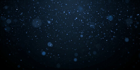 Blue glowing dust particles floating softly in space, elegant abstract background with shimmer light. Bokeh light effect